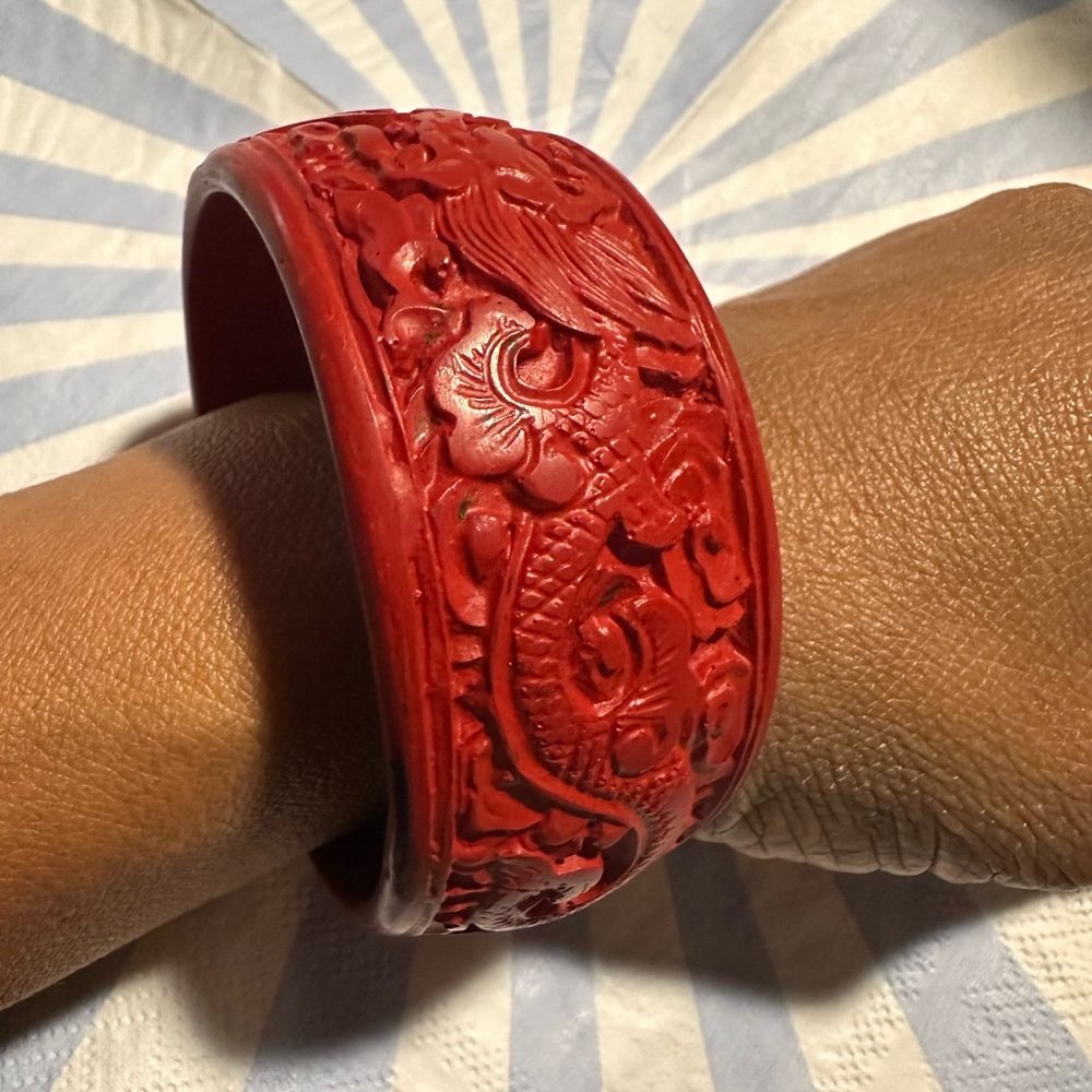 Intricately Carved Red Bangle Bracelet